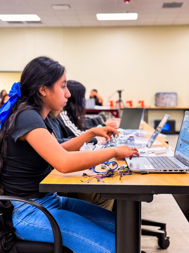 a girl working on a computer