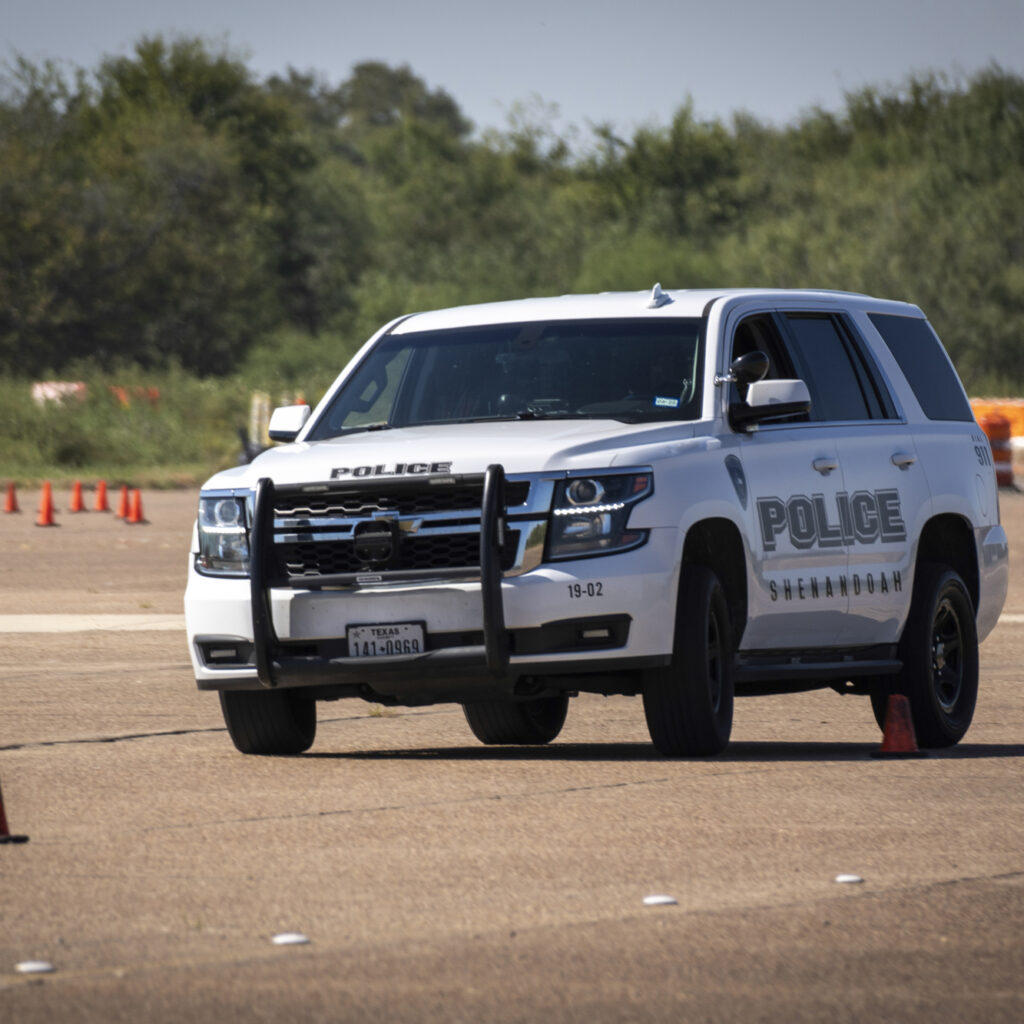 Picture of a police vehicle on the emergency vehicle driving track during the Emergency Vehicle Operations Instructor course