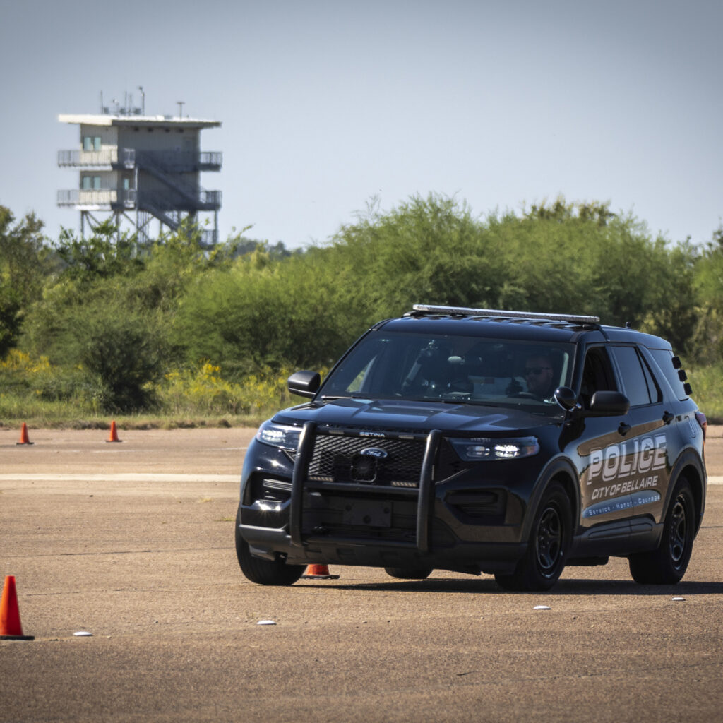 Picture of a police vehicle on the emergency vehicle driving track during the Emergency Vehicle Operations Instructor course
