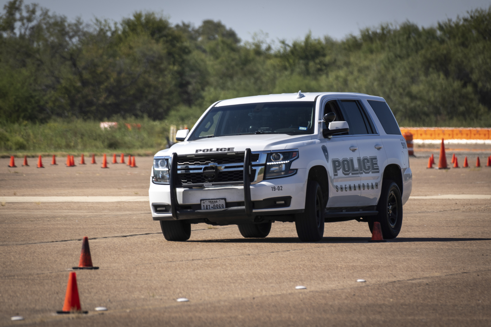 Picture of a police vehicle on the emergency vehicle driving track during the Emergency Vehicle Operations Instructor course
