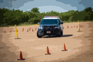 Picture of a police vehicle on the emergency vehicle driving track during the Emergency Vehicle Operations Instructor course