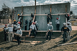 Rescuers stabilizing a building