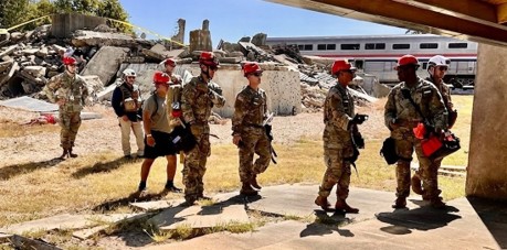 Homeland Response Force members practice confined space triage at Disaster City