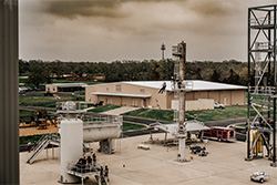Industrial area with many large pieces of equipment