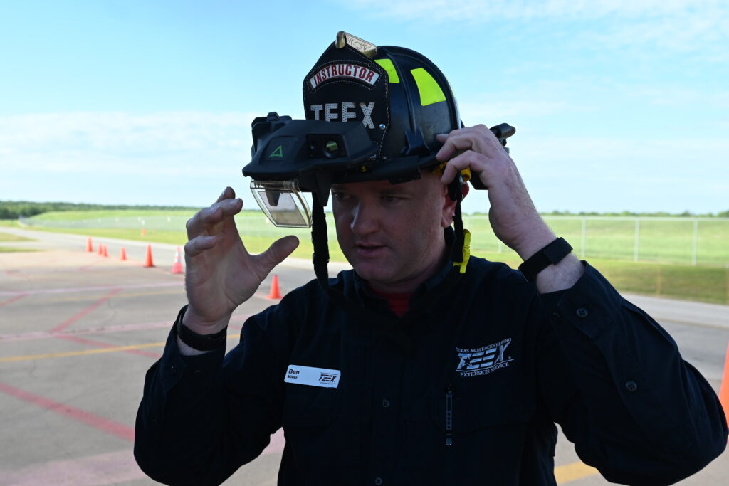 a man wearing a firefighting helmet