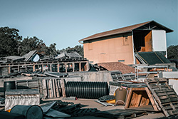 Building with piles of rubble