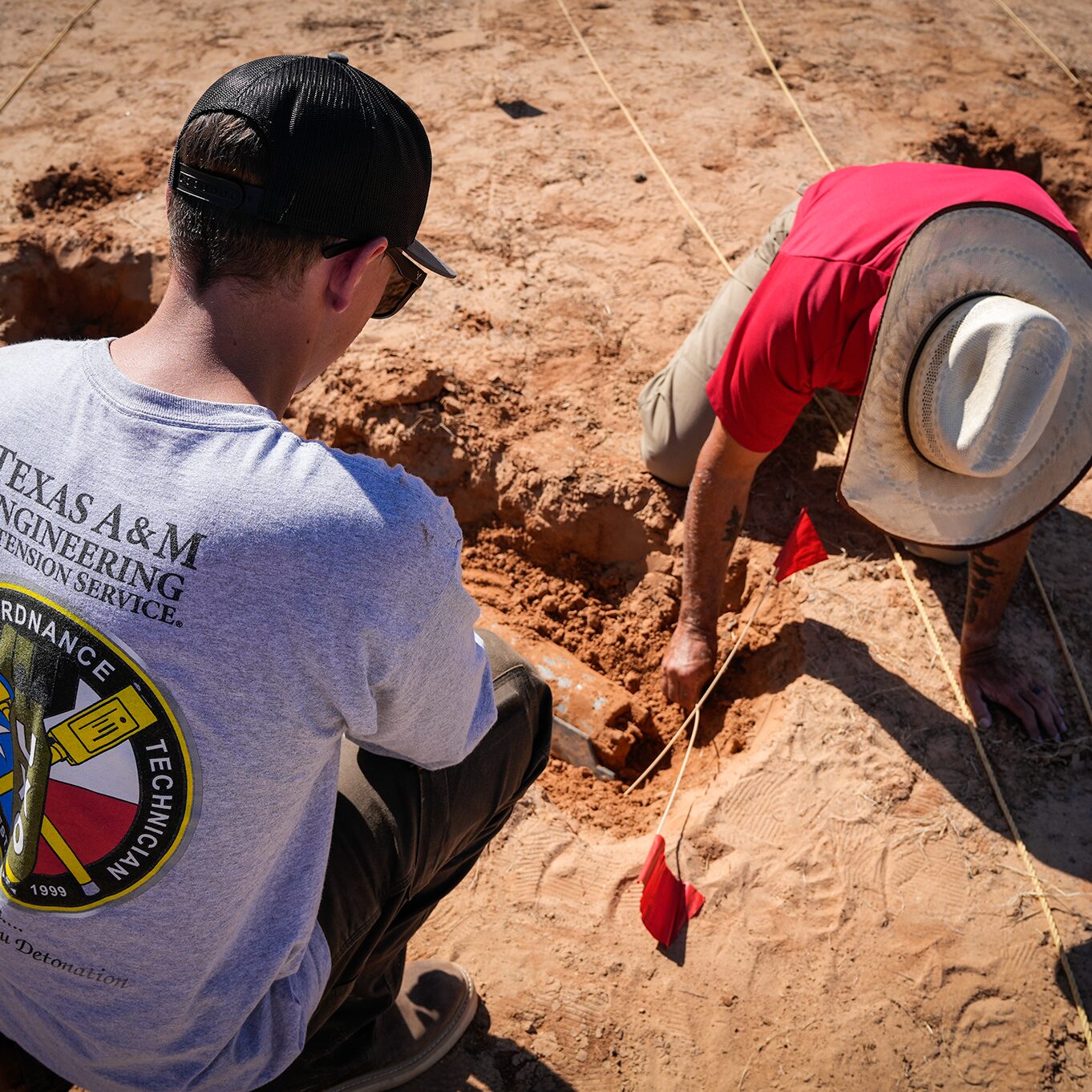 A student learns how to properly excavate a buried UXO during a recent UXO Technician I training course.