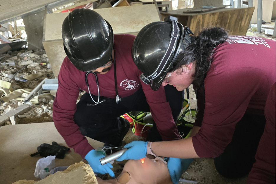 Paramedic trainees practicing confined space rescue on a cadaver at Disaster City®