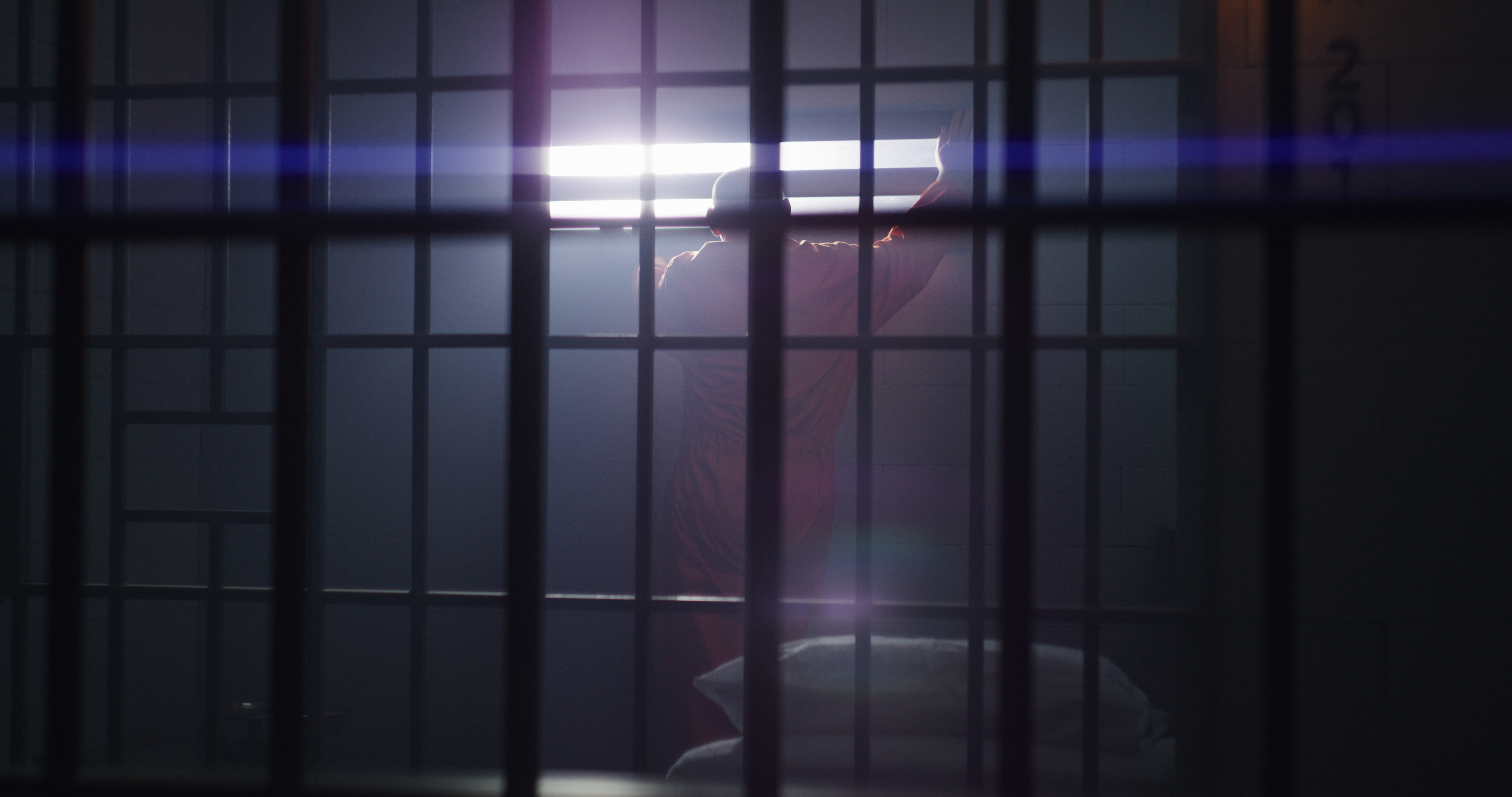 Male inmate in jail cell