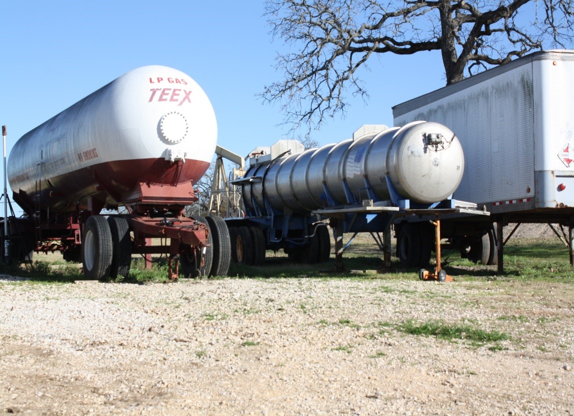 liquid transport containers in a field